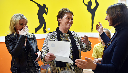 Members of Croxteth Gems being greeted by Big Lottery Fund's Dawn Austwick